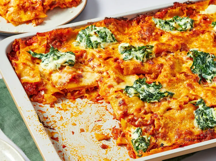 Sheet pan lasagna finished with pieces missing